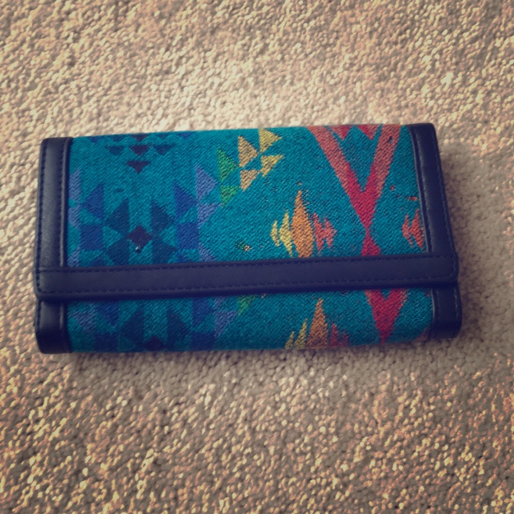 Multi-colored bi-fold wallet.
